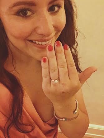 Lauren and the ring and the big happy grin. 